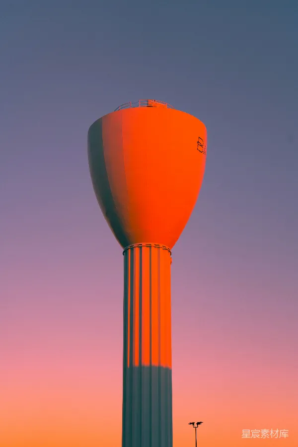 高清摄影 夕阳下的橙色水塔
