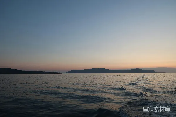 高清摄影 日落海景与远岛轮廓