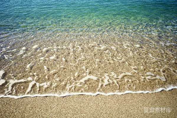 高清摄影 白天海滩上的棕色沙粒
