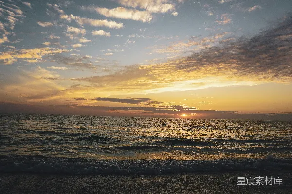 高清摄影 橙色天空下的海边