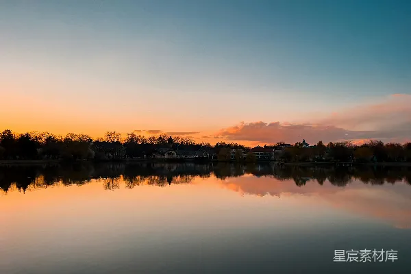 高清摄影 水边有树木和夕阳的背景
