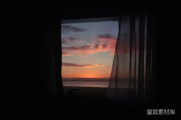 高清摄影 带海景 sunset 窗帘的窗户