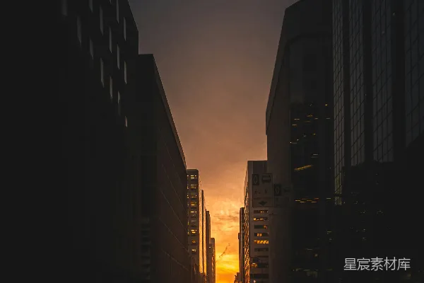 高清摄影 观看高耸建筑间道路的 sunrise 摄影图