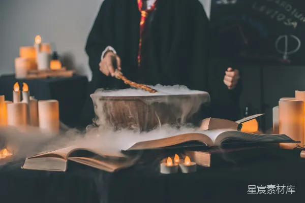 高清摄影 手持魔杖的人站在碗的上方