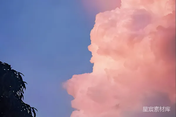 高清摄影 夕阳下建筑物上的粉色云彩
