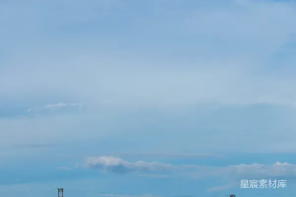 高清摄影 白天城市建筑上的白云