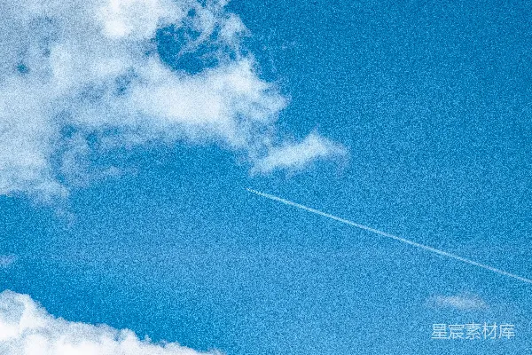 高清摄影 空中飞行的飞机，在它身后有尾迹。