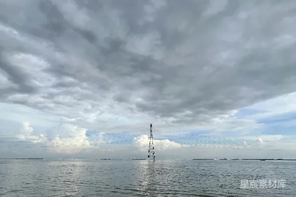 高清摄影 远处有一座塔的水域