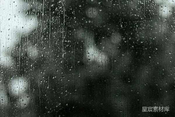 高清摄影 透过雨帘看的一栋建筑的景象