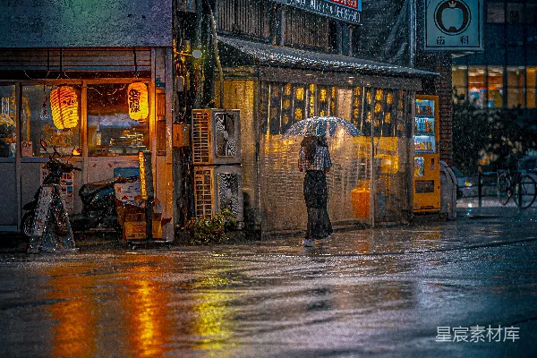 高清摄影 撑伞的人站在雨中