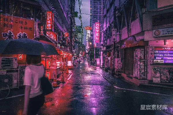 高清摄影 街上一位妇女正在持伞行走