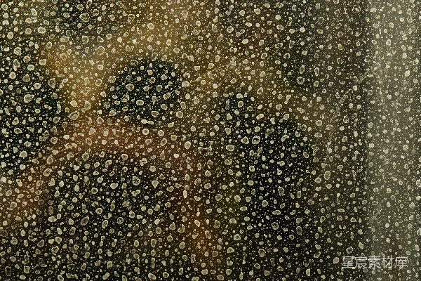 高清摄影 模糊的虚化光斑在一个有纹理的黑暗背景中