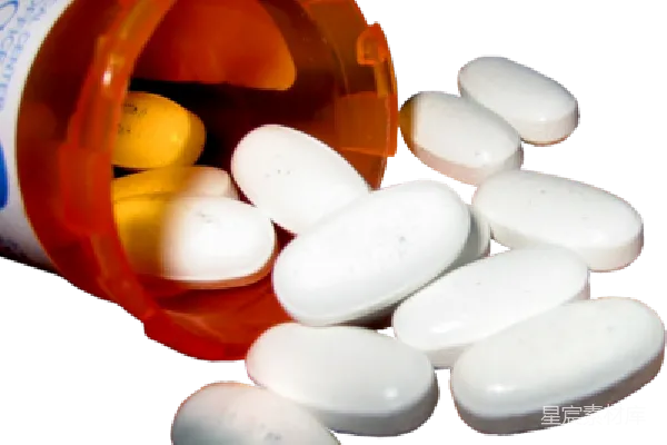 元素素材 倾倒出药片的橙色药瓶