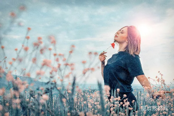 高清摄影 女手持红花