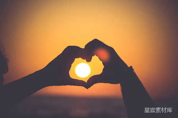 高清摄影 人的手影形成心形