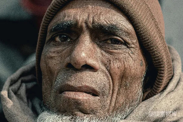 高清摄影 一个戴着棕色帽子和围巾的男人