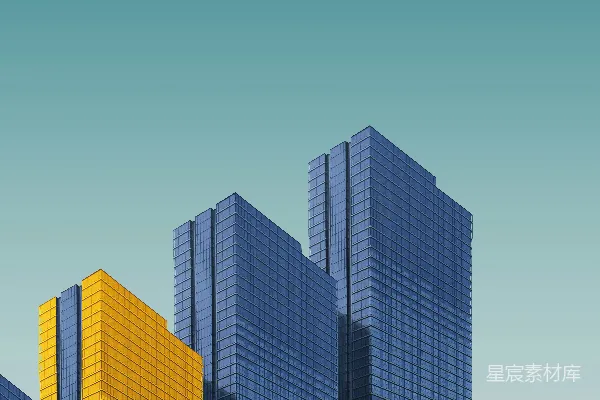 高清摄影 蓝黄相间的幕墙建筑在白天。