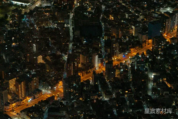 高清摄影 夜晚城市的空中俯瞰图，闪烁着灯火。