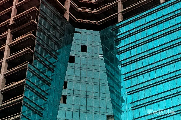 高清摄影 低角度拍摄的蓝棕色玻璃高层建筑