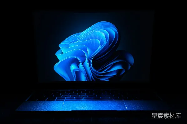 高清摄影 在黑暗中的一台MacBook Air笔记本电脑