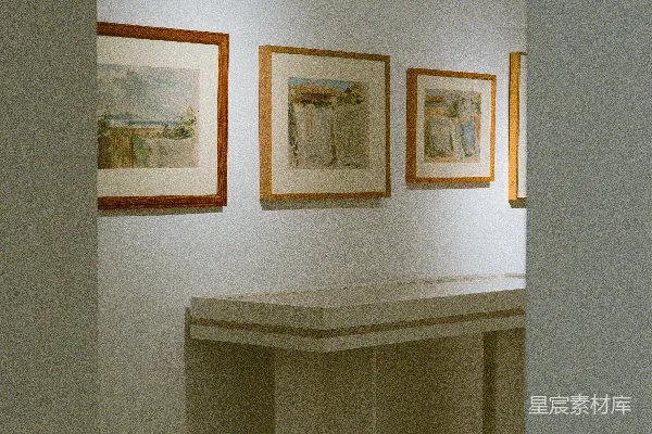高清摄影 一间房间里有一张桌子和墙上的画作。