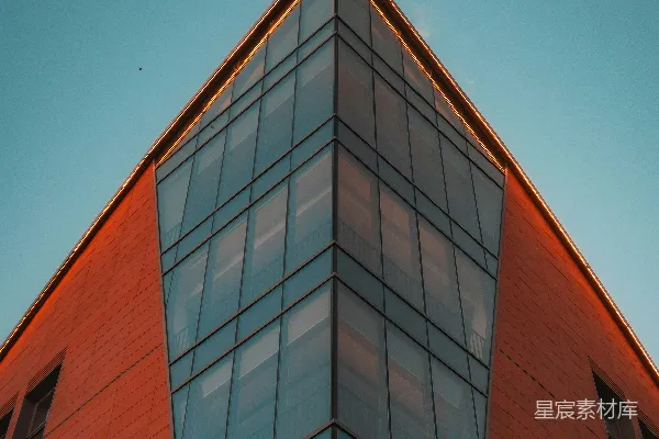 高清摄影 现代化的建筑，玻璃转角和橙色外墙