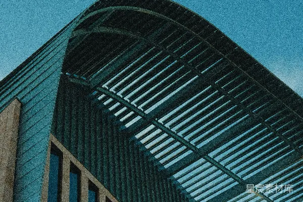 高清摄影 现代建筑，屋顶弯曲，背景是蓝天。