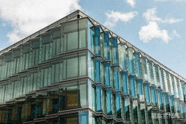 高清摄影 现代玻璃办公楼在多云的天空下