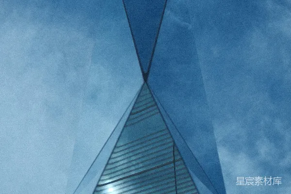 高清摄影 现代玻璃建筑在阴云密布的蓝色天空下