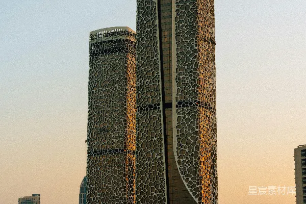 高清摄影 现代摩天大楼在温暖的夕阳光辉下辉映。