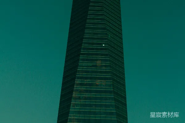 高清摄影 现代化摩天大楼矗立在青色的天空下。