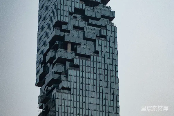 高清摄影 现代摩天大楼，拥有独特的像素化外墙设计。