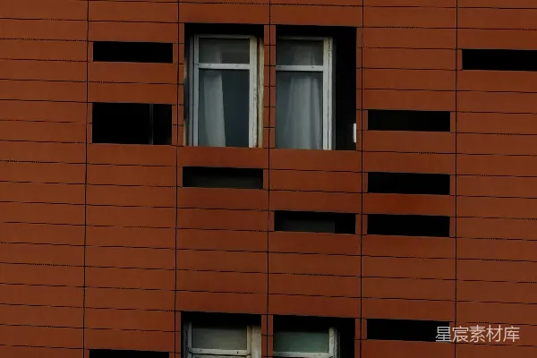 高清摄影 现代建筑的立面，带有棕色面板和不规则排列的窗户。