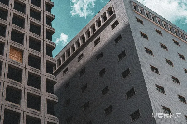 高清摄影 两座现代化的建筑物在多云的天空下