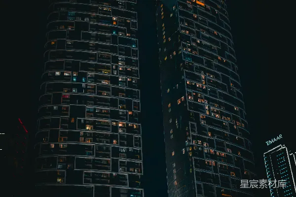 高清摄影 现代化的摩天大楼在夜晚灯光闪烁，拱门隐约可见。