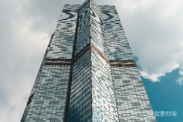 高清摄影 现代玻璃幕墙摩天大楼映衬着多云的天空