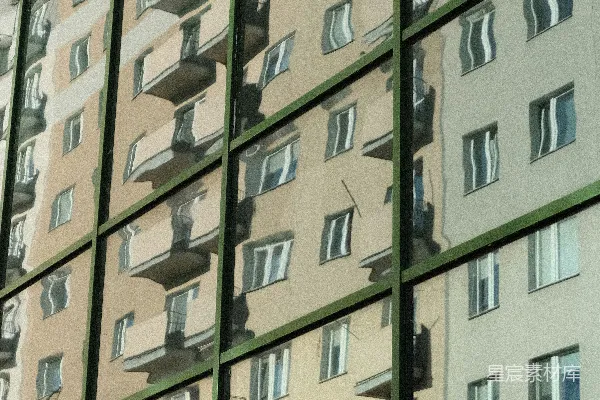 高清摄影 一幢建筑物在另一栋建筑物的窗户中反射。