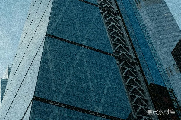 高清摄影 现代玻璃高层建筑在晴朗的蓝天背景下。