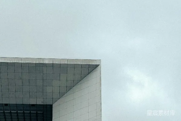 高清摄影 现代建筑的角落与阴云密布的天空相映成趣