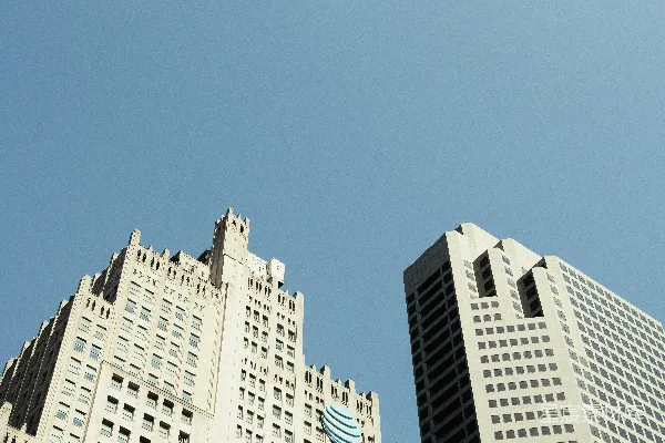 高清摄影 两栋现代化摩天大楼在清澈的蓝天背景下