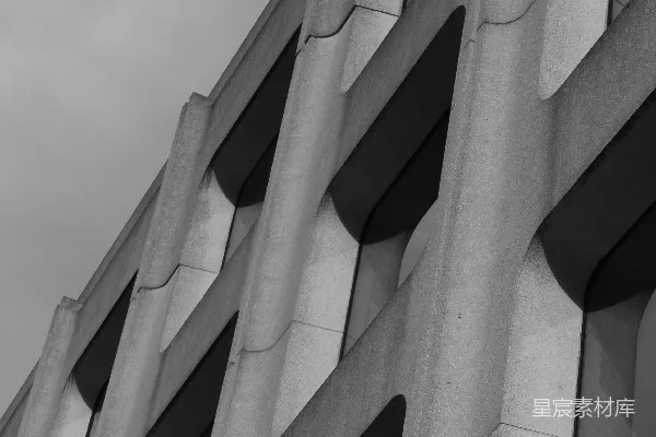 高清摄影 抽象的 Brutalist 建筑风格，带有重复的窗户图案。
