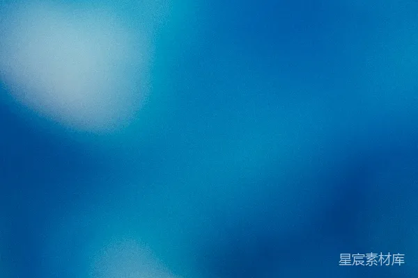 高清摄影 抽象的蓝色背景，带有模糊的光斑。