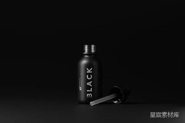高清摄影 一个黑色的瓶子，带有黑色瓶盖和银色瓶盖。