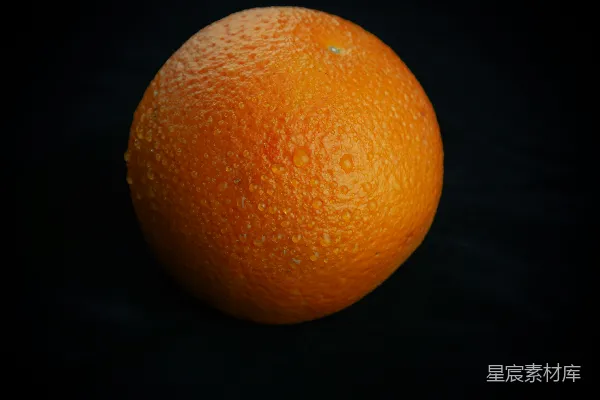 高清摄影 黑底特写一个橙子