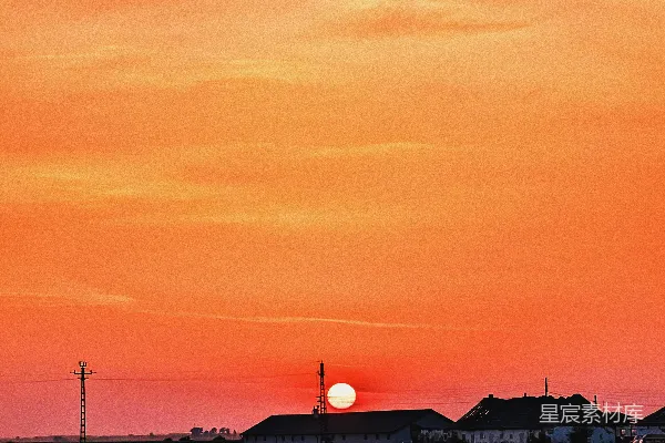 高清摄影 夕阳正挂在乡村地平线上。