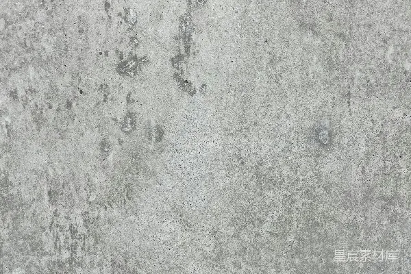 高清摄影 一堵灰色的混凝土墙，上面有小洞。