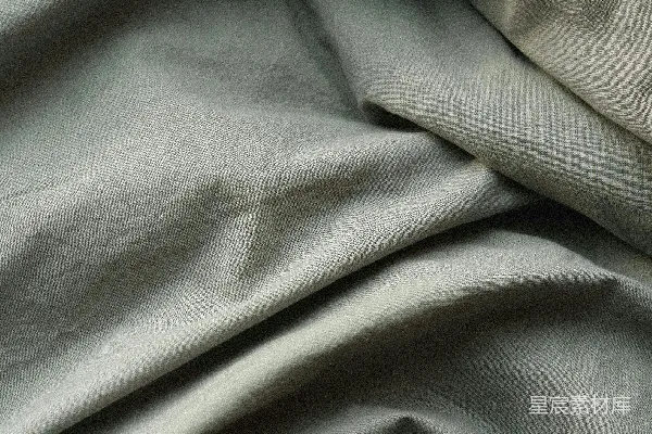高清摄影 一张铺有白色床罩的床的特写。