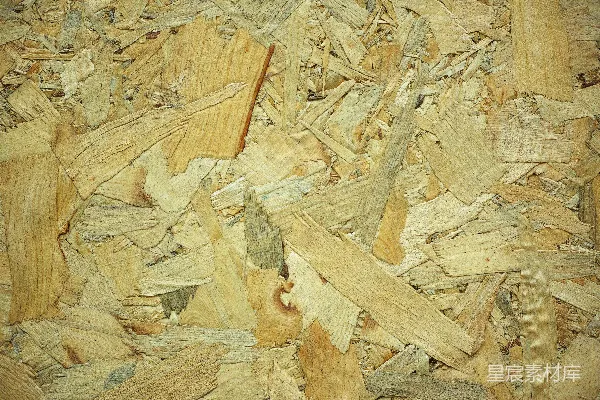 高清摄影 棕色的木头原木放在棕色的木制表面上
