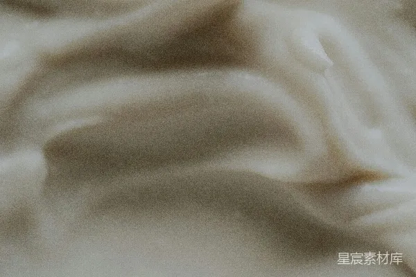 高清摄影 一张白色的霜冻蛋糕的特写照片