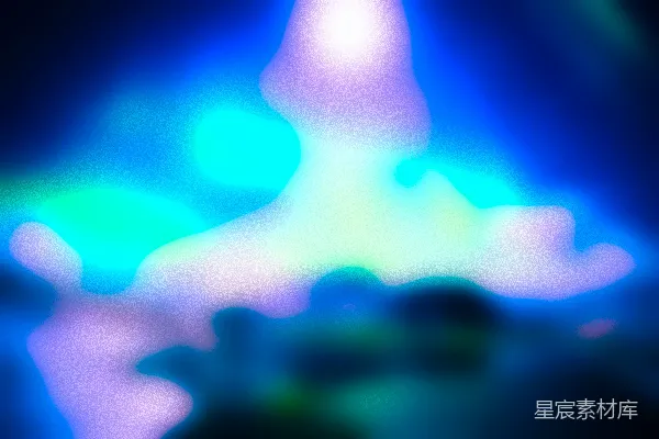 一幅模糊的蓝色和绿色光的图像
